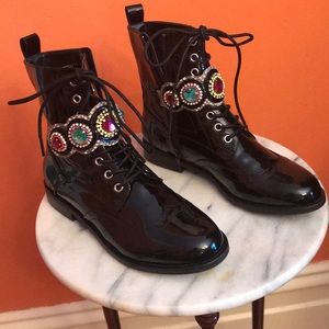 Black patent leather combat boots